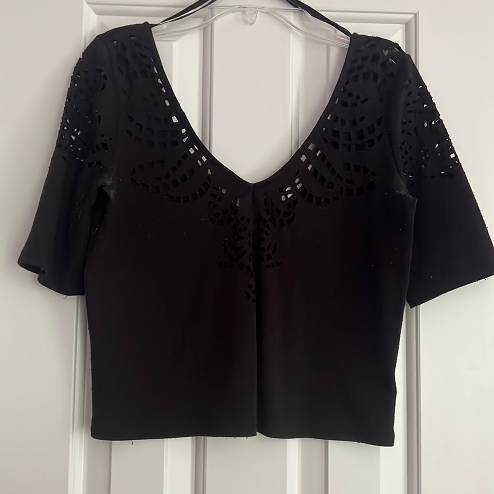 Kimchi Blue black quarter sleeved crop top with cut outs in the front and back!